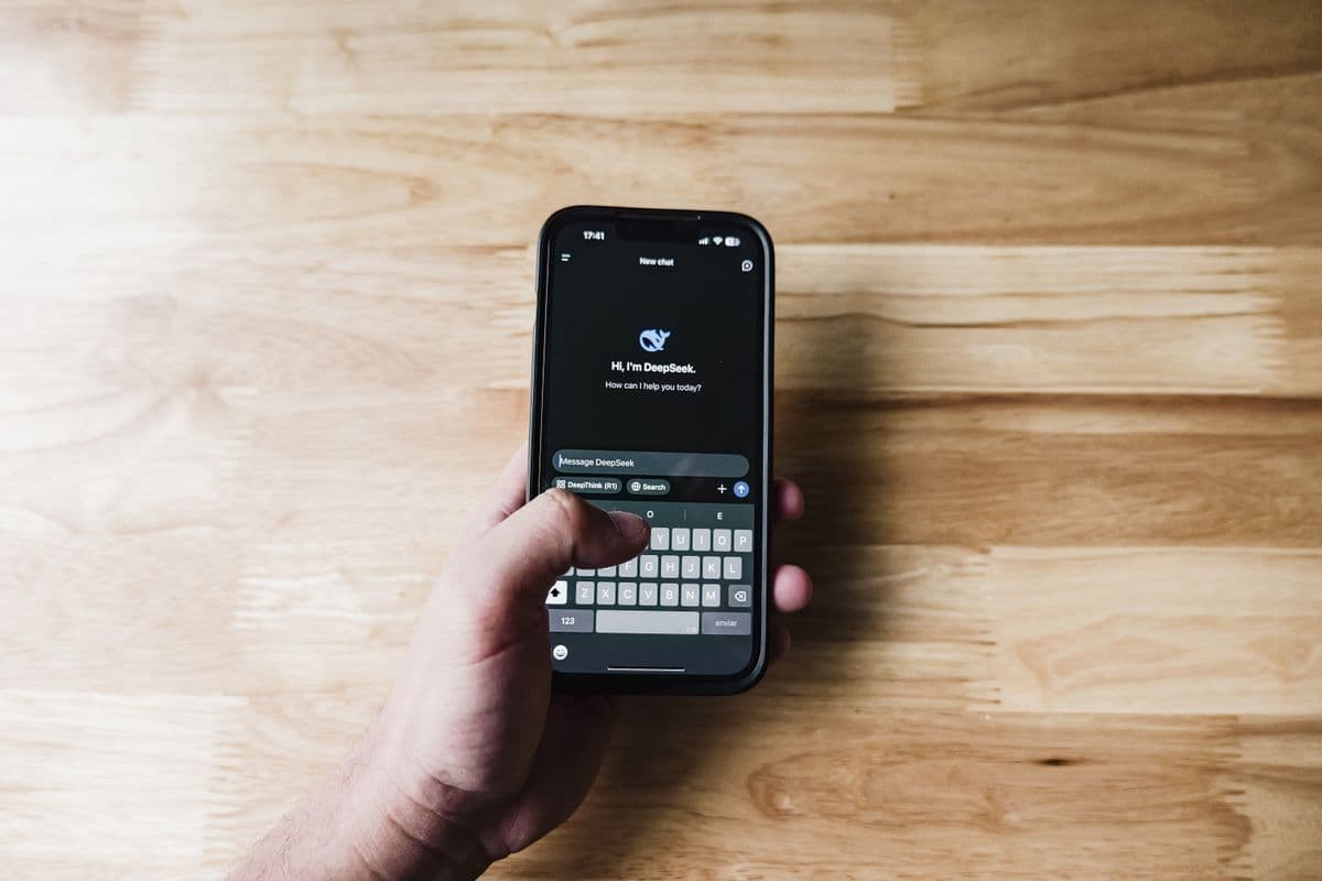 Person interacting with an AI assistant on a smartphone