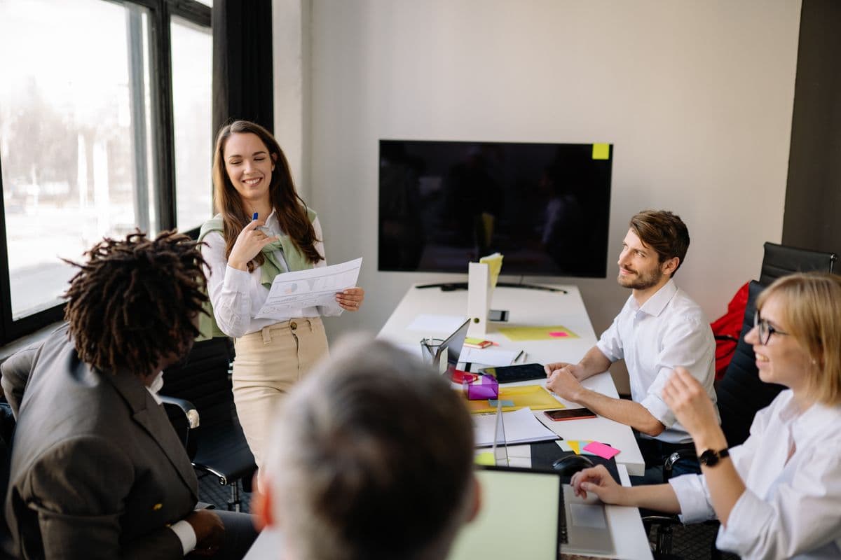 Synexis Asist specialists reviewing client work together